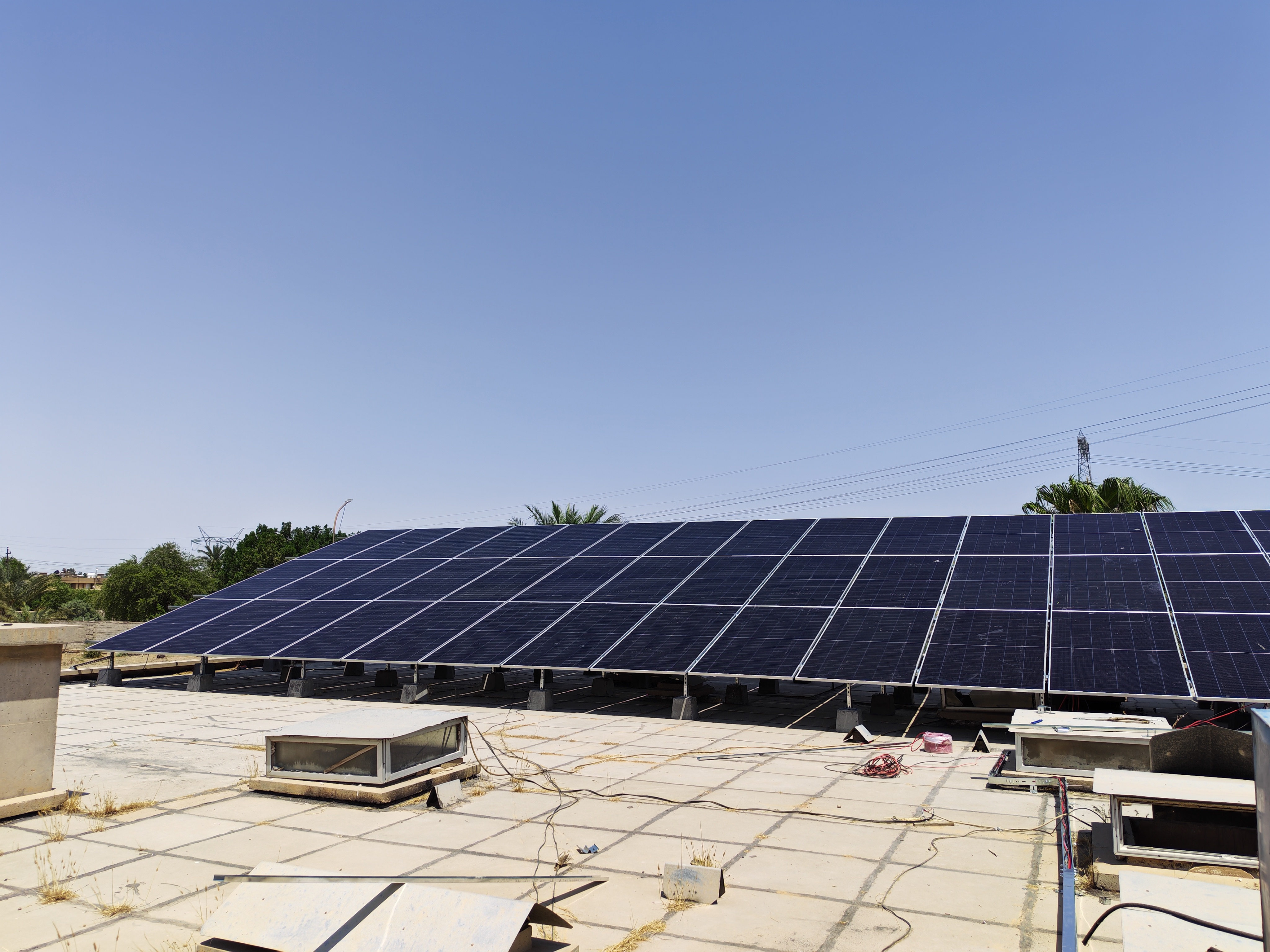 80 kW solar array of 100 Jinko 725 W panels at the General Company for Food Stuff Trading site in Al-Taji, Baghdad